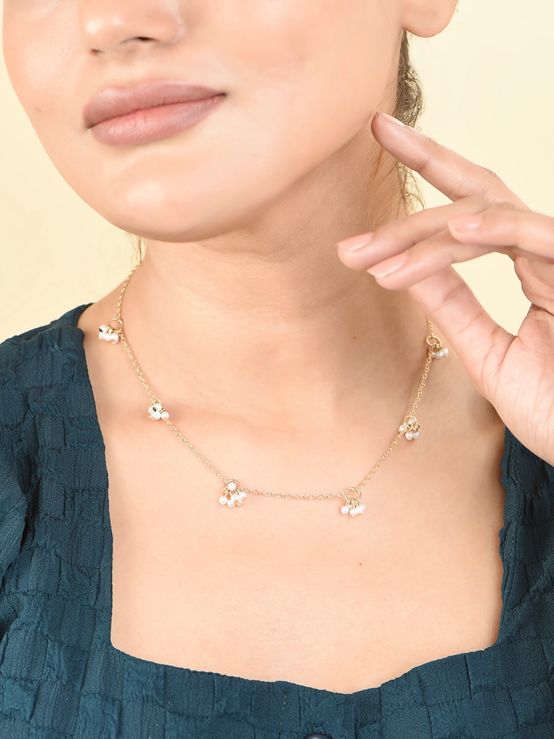 

ToniQ Gold Plated Artificial Beads Statement Necklace