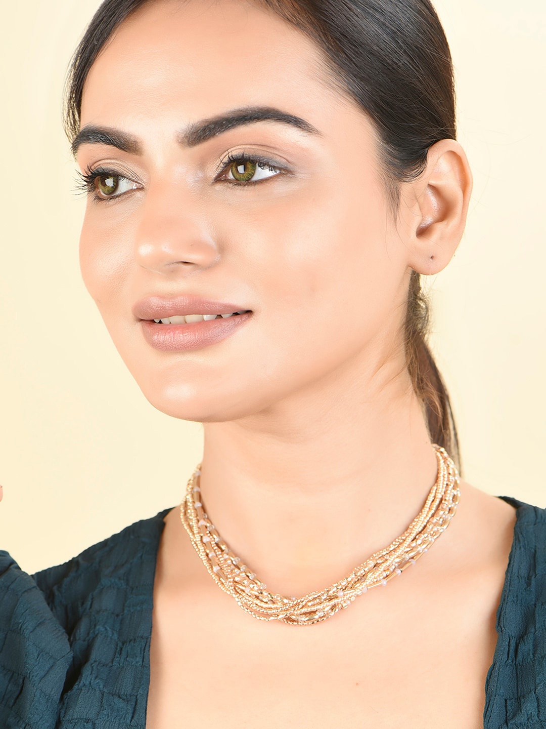 

ToniQ Gold Plated Artificial Beads Statement Necklace