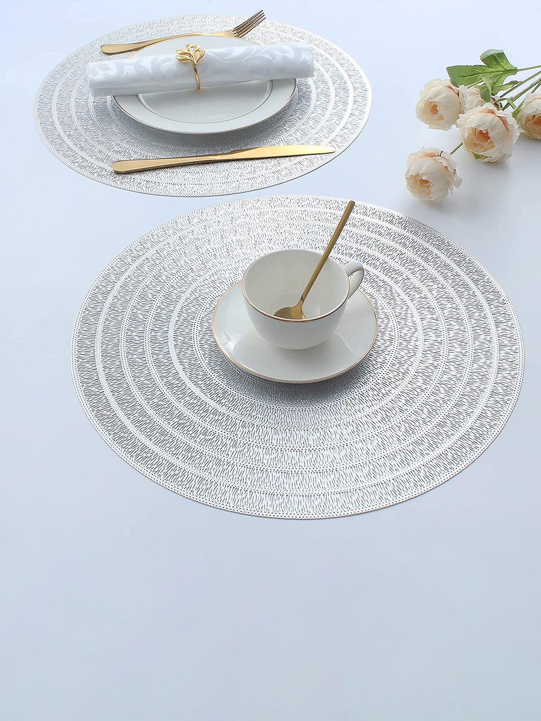 

Dakshya Industries Silver Toned 4 Pieces Round Kitchen Table Placemats