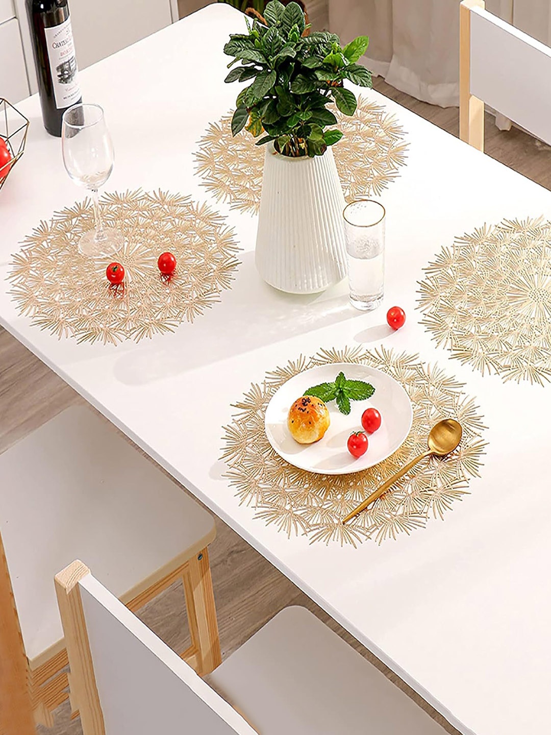 

Dakshya Industries Gold Toned 4 Pieces Round Table Placemats