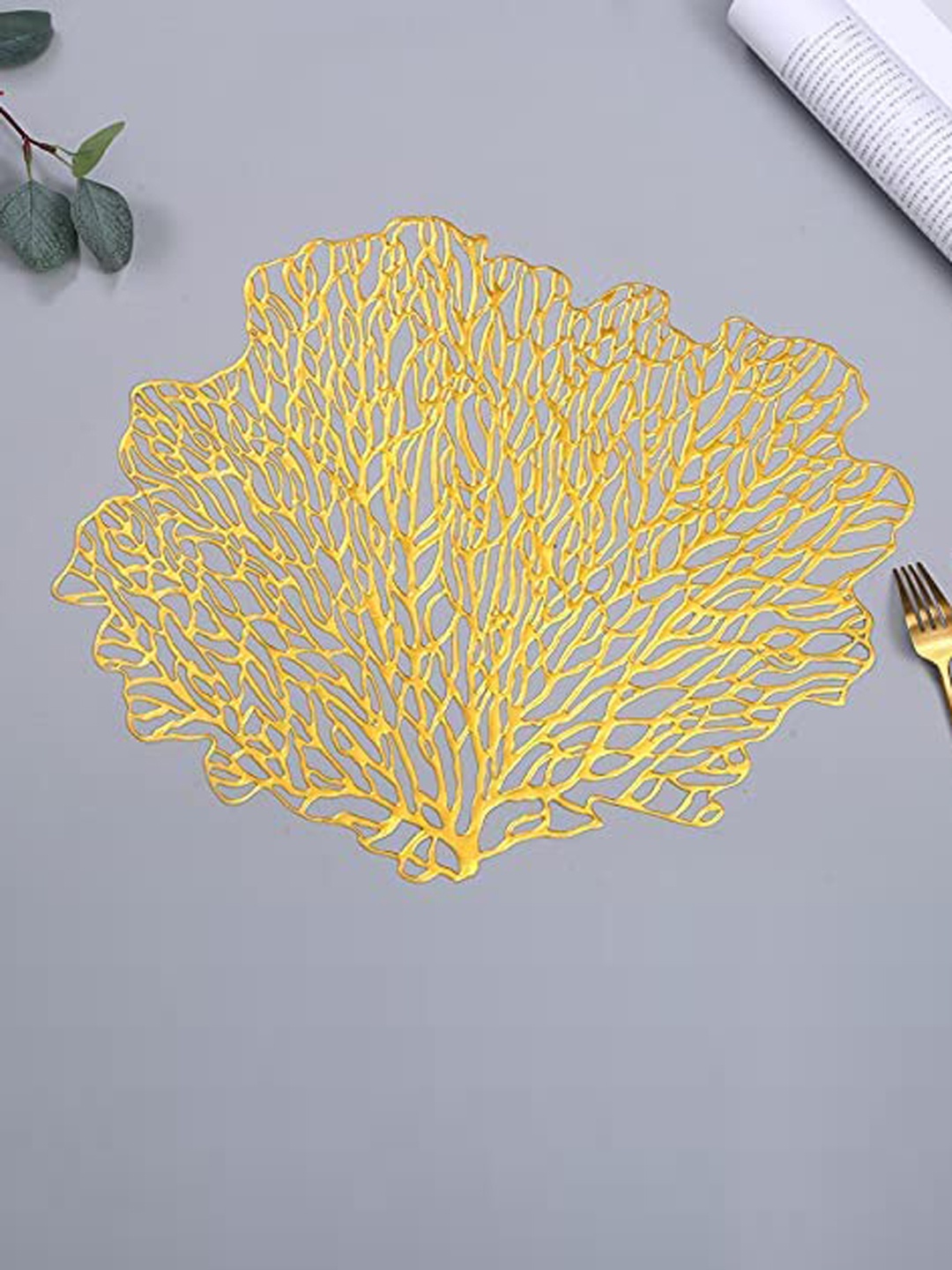 

Dakshya Industries Gold Toned 4 Pieces Pankh Shaped Table Placemats