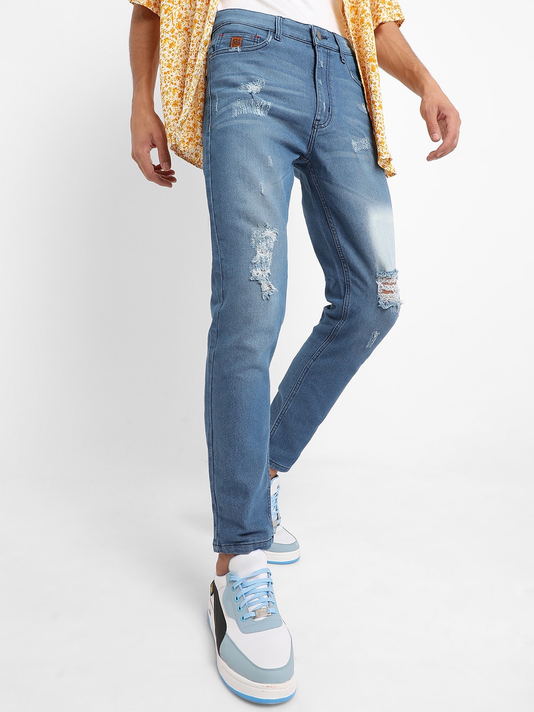 

Campus Sutra Men Blue Smart Mildly Distressed Light Fade Stretchable Jeans