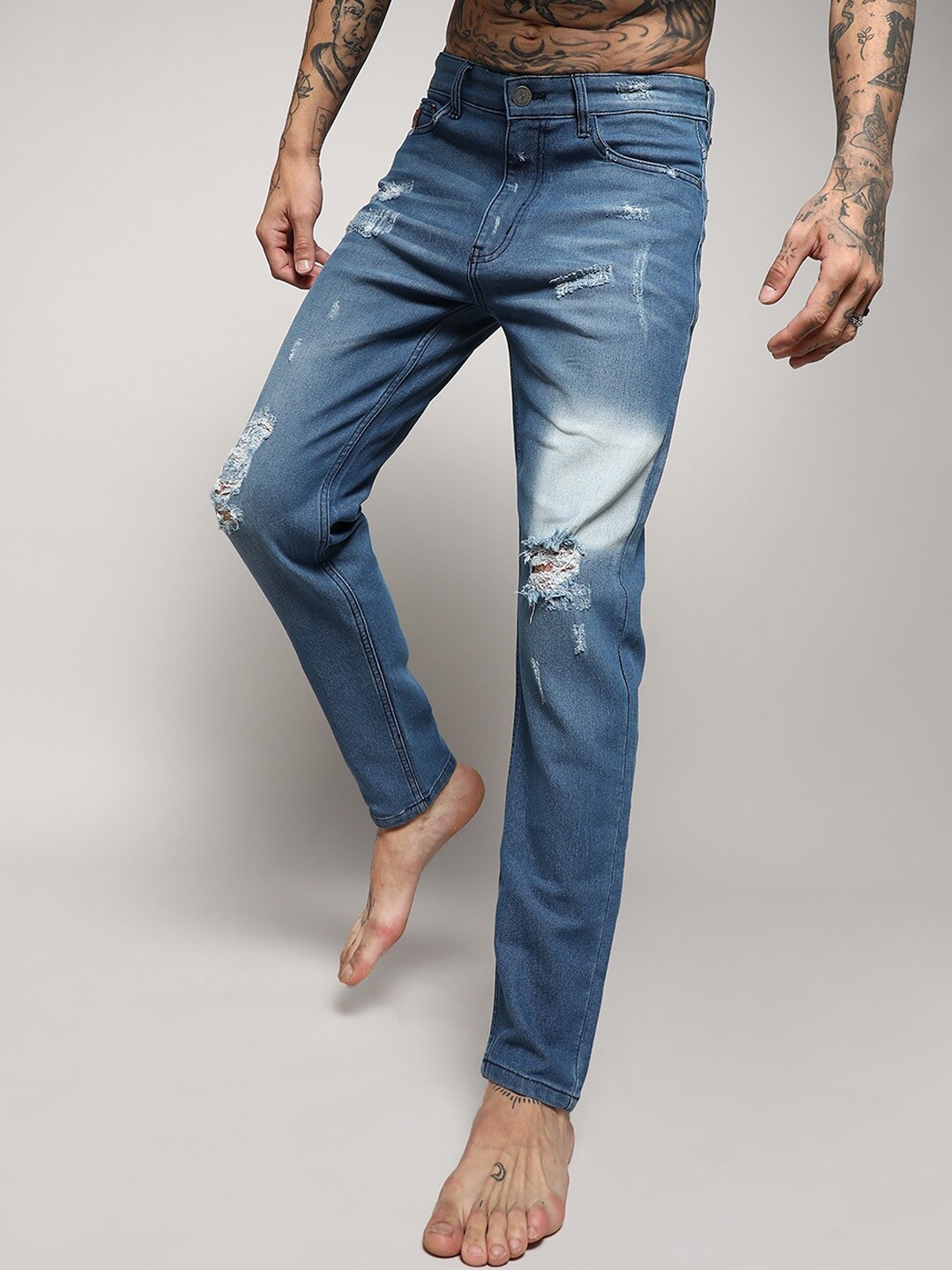 

Campus Sutra Men Blue Smart Mildly Distressed Light Fade Stretchable Jeans