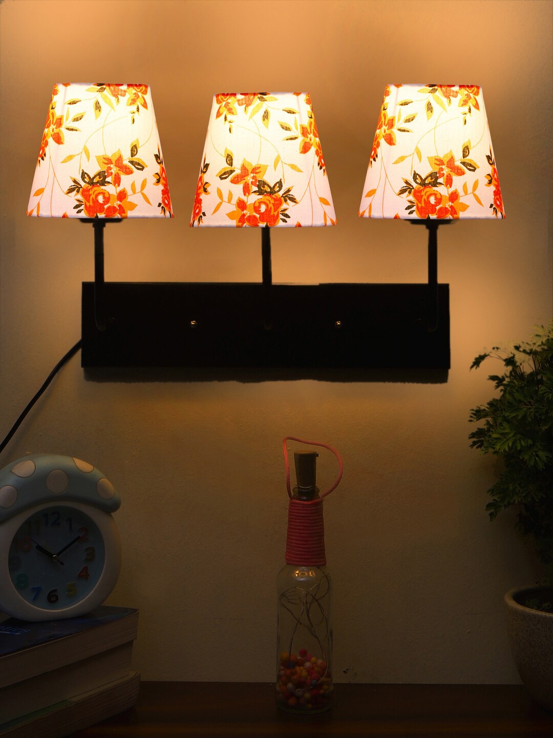 

Devansh White & Orange Floral Printed Cylindrical Cotton Cluster Wall-Mounted Lamp