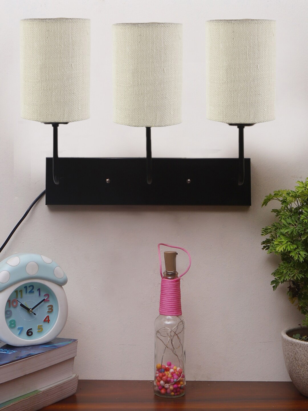 

Devansh White & Black Cylindrical Jute Cluster Wall-Mounted Lamp