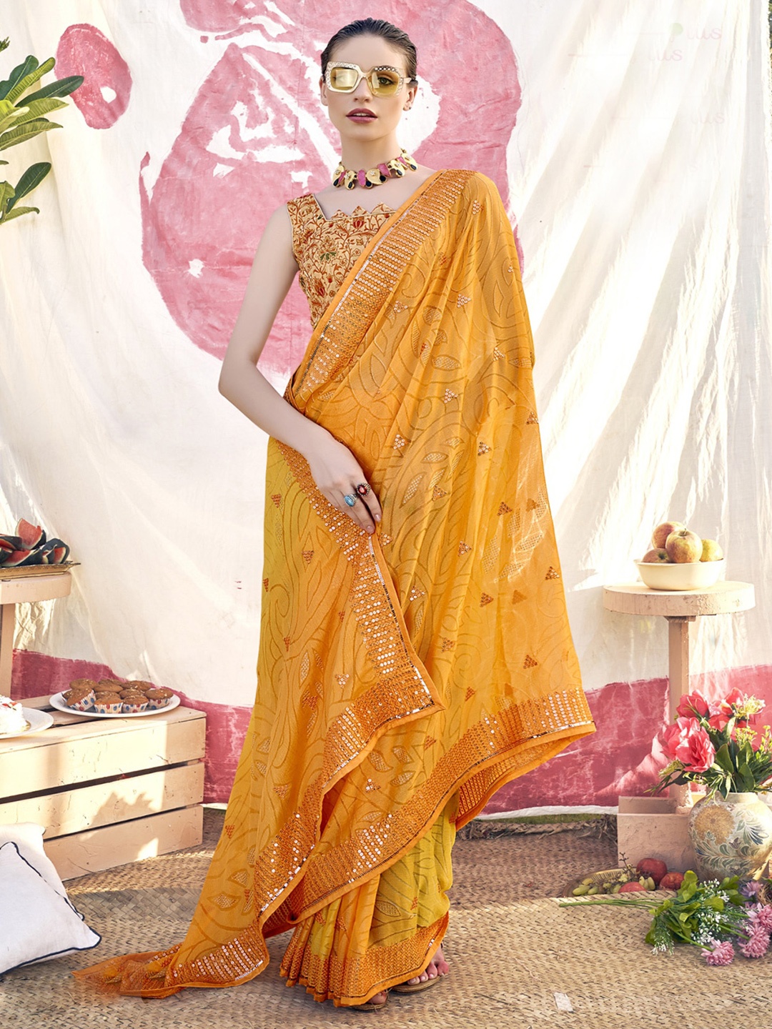 

KALINI Yellow & Red Ethnic Motifs Embroidered Brasso Saree