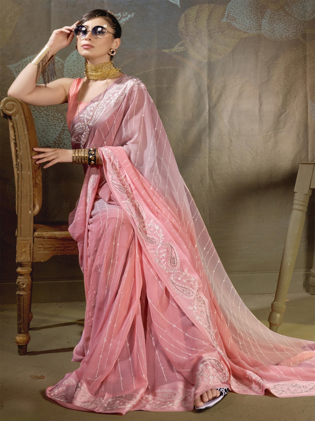

KALINI Peach-Coloured Striped Sequinned Pure Georgette Saree
