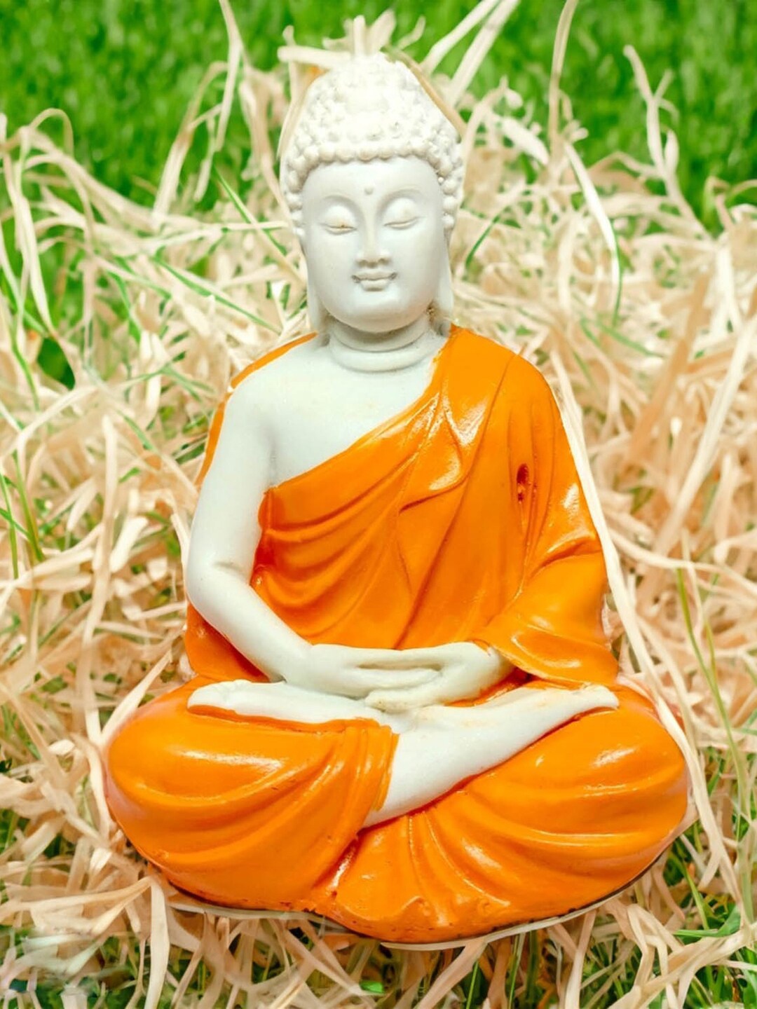 

ZURU BUNCH Orange-Coloured & White Sitting Buddha Showpieces
