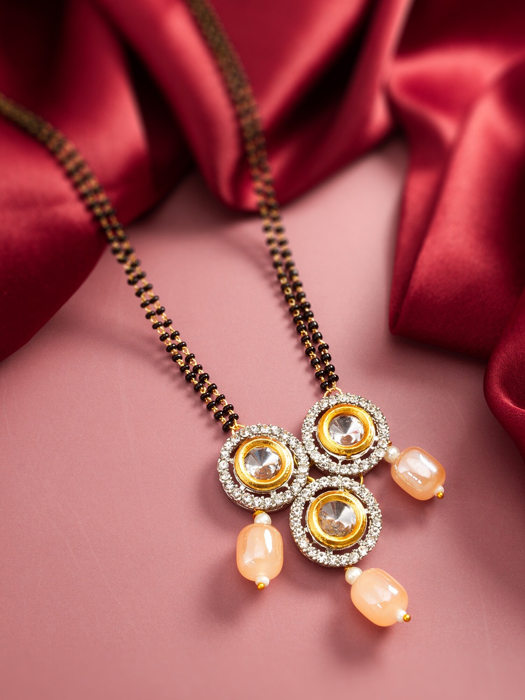 

aadita Gold Plated Floral Shaped Kundan Studded & Pearls Beaded Mangalsutra