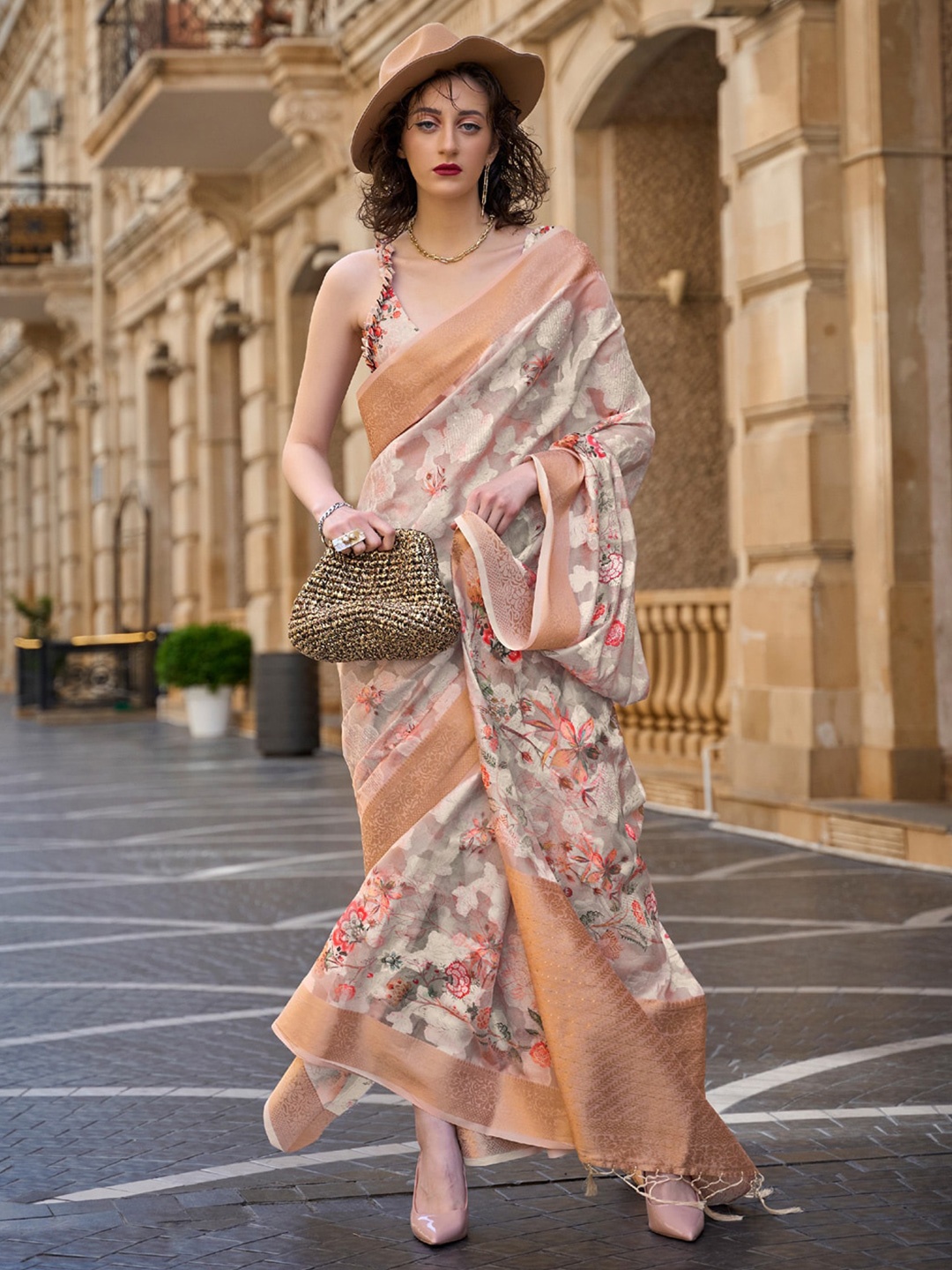 

Mitera Cream-Coloured & Red Floral Woven Design Embellished Zari Sungudi Saree