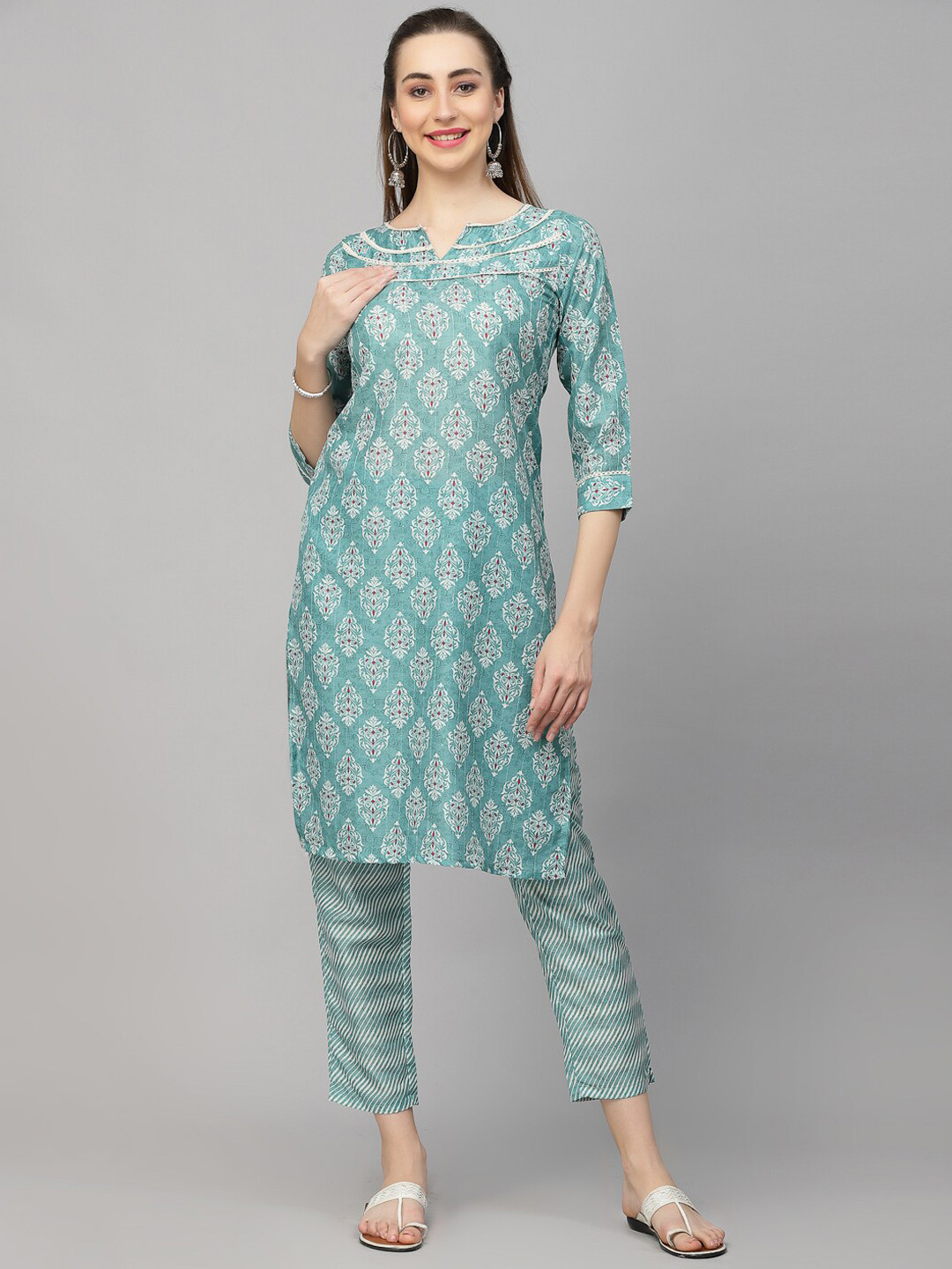 

18 ATTITUDE Turquoise Blue Floral Printed Regular Kurta with Trousers