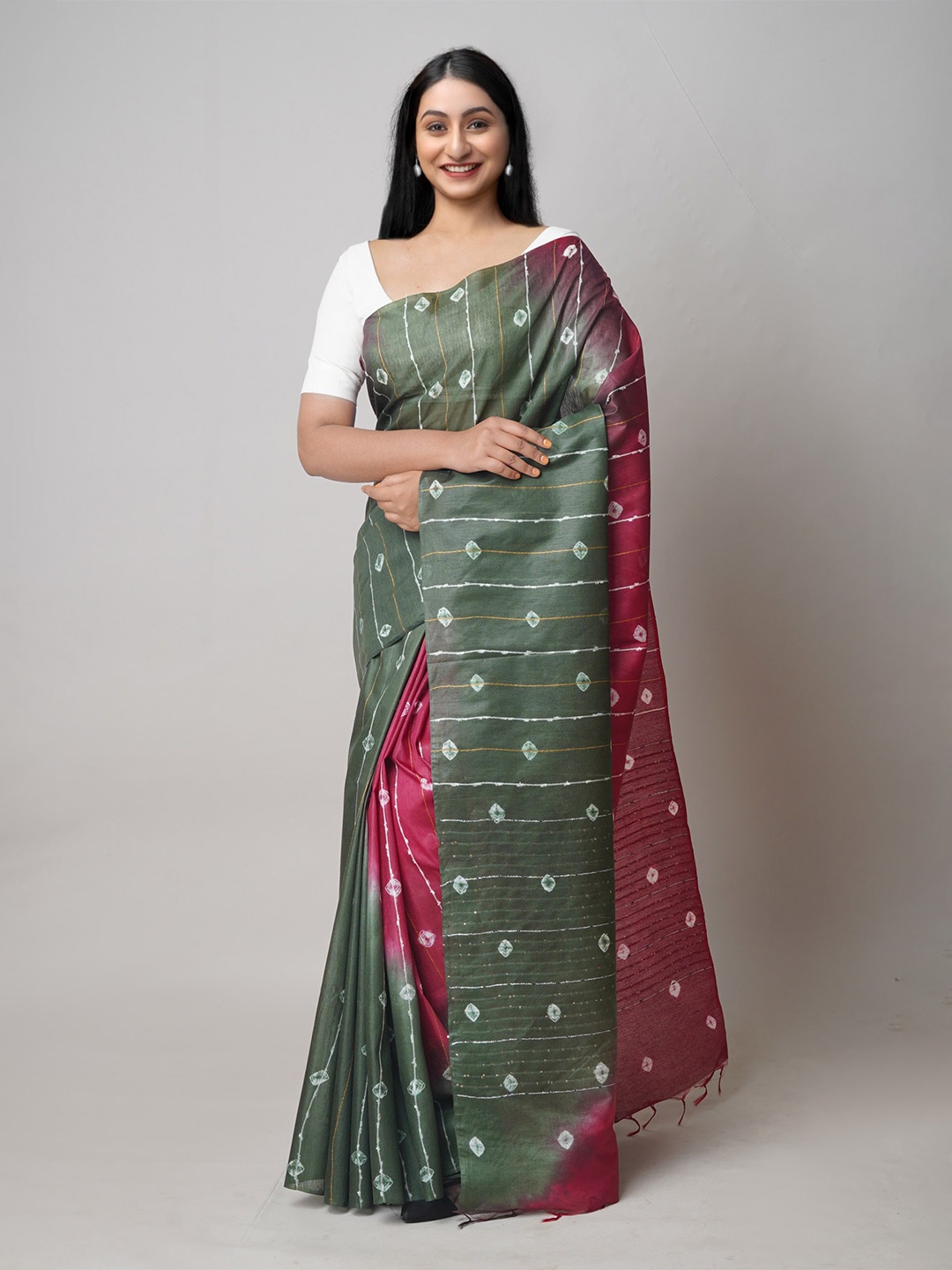 

Unnati Silks Green & Red Tie and Dye Sequinned Silk Cotton Handloom Leheriya Saree
