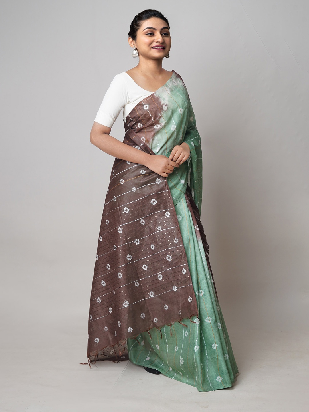 

Unnati Silks Green & Brown Tie and Dye Zari Silk Cotton Leheriya Saree