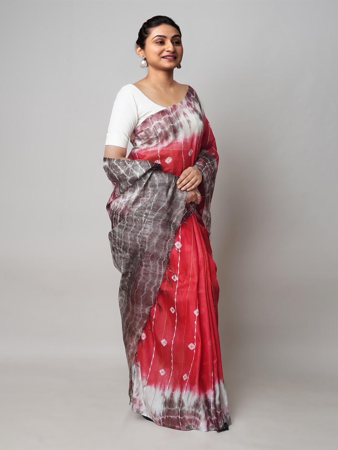 

Unnati Silks Tie and Dye Sequinned Silk Cotton Leheriya Saree, Red