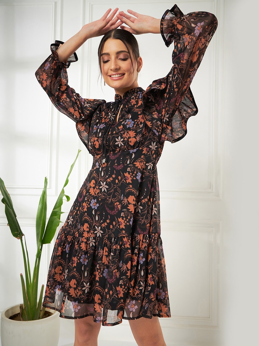 

Kibo Black Floral Printed Tie-Up Neck Georgette Fit & Flare Dress