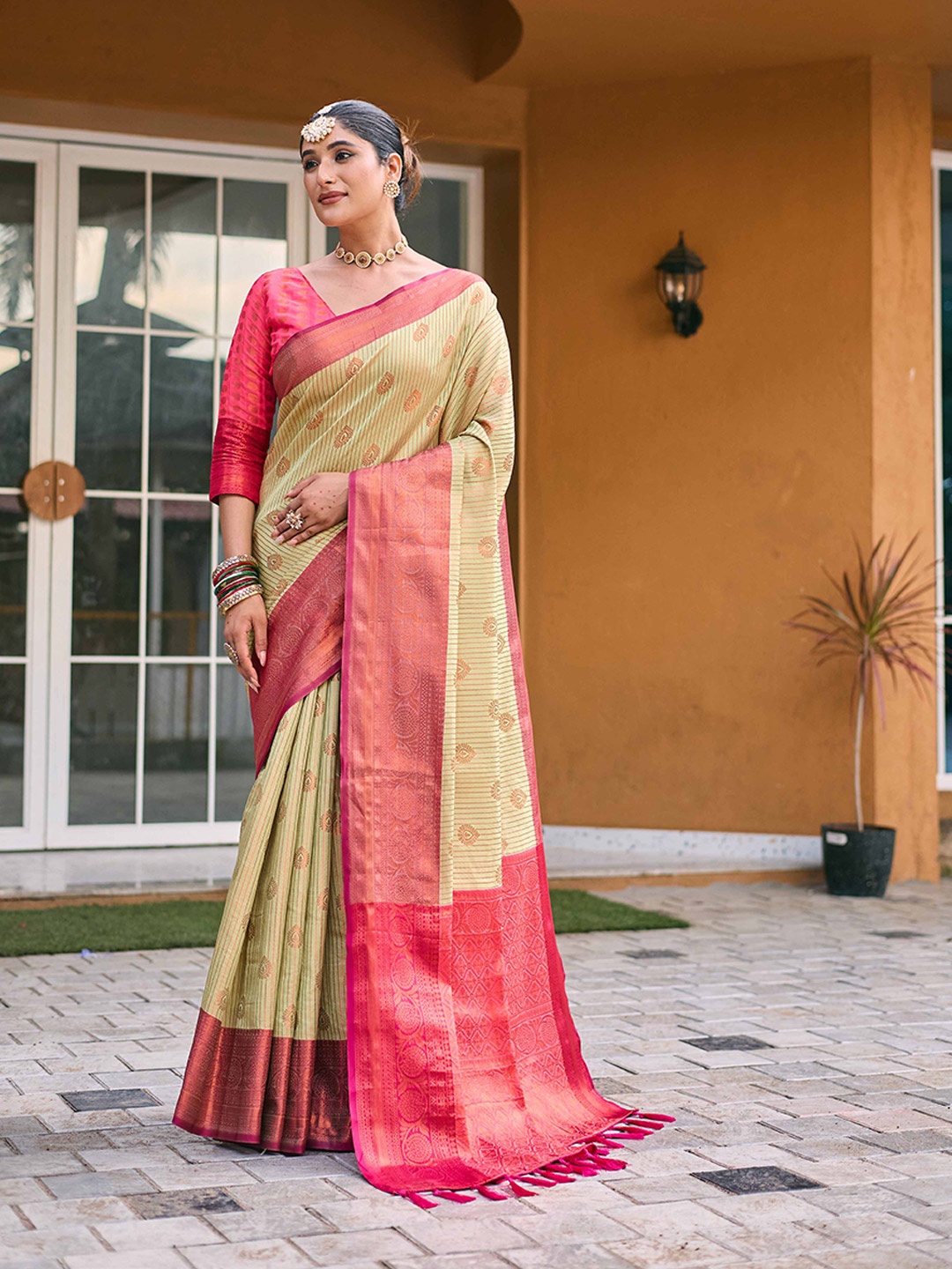 

Mitera Green & Pink Ethnic Motif Woven Design Zari Kanjeevaram Saree