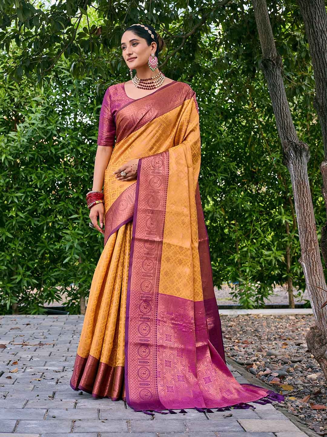 

Mitera Mustard & Purple Ethnic Motif Woven Design Zari Kanjeevaram Saree
