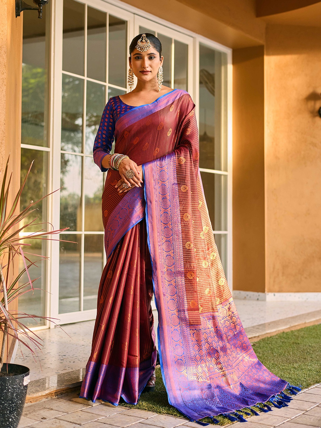 

Mitera Ethnic Motifs Woven Design Zari Kanjeevaram Saree, Maroon