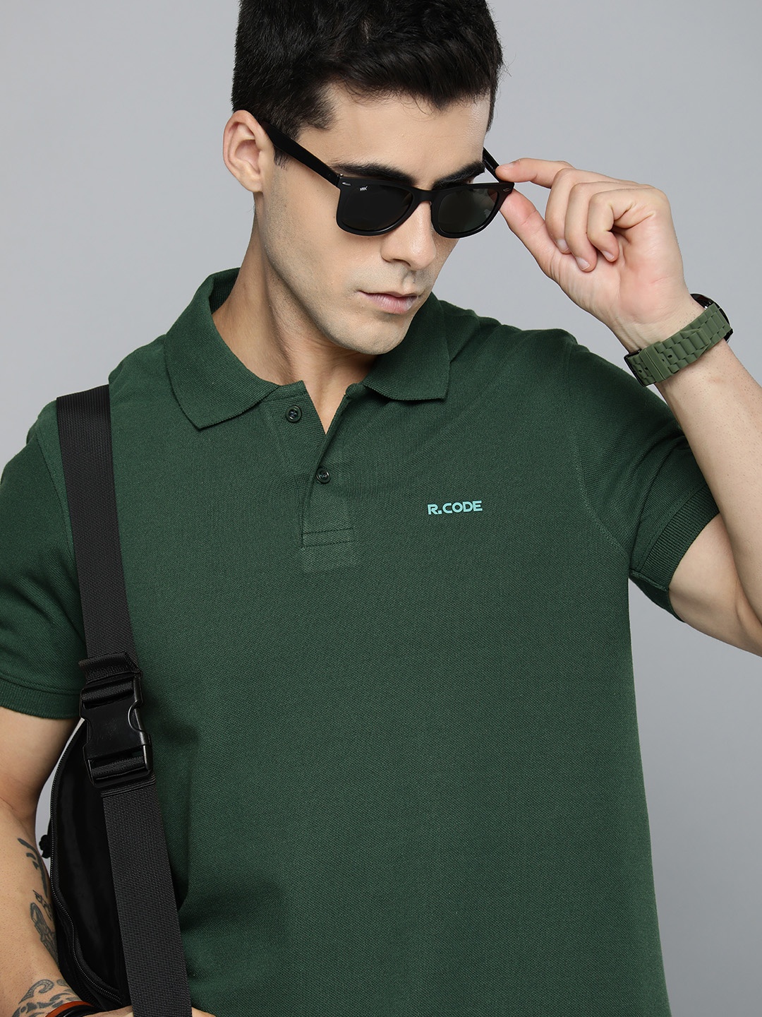 

R.Code by The Roadster Life Co. Men Solid Polo Collar T-shirt, Green