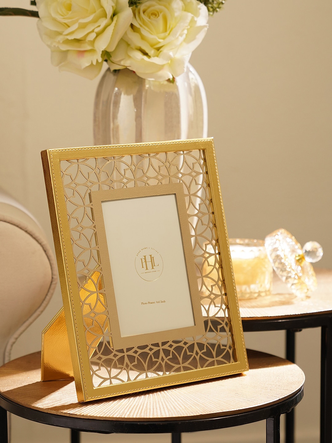 

Pure Home and Living Gold Toned Lazer Cut Faux Leather Photo Frame