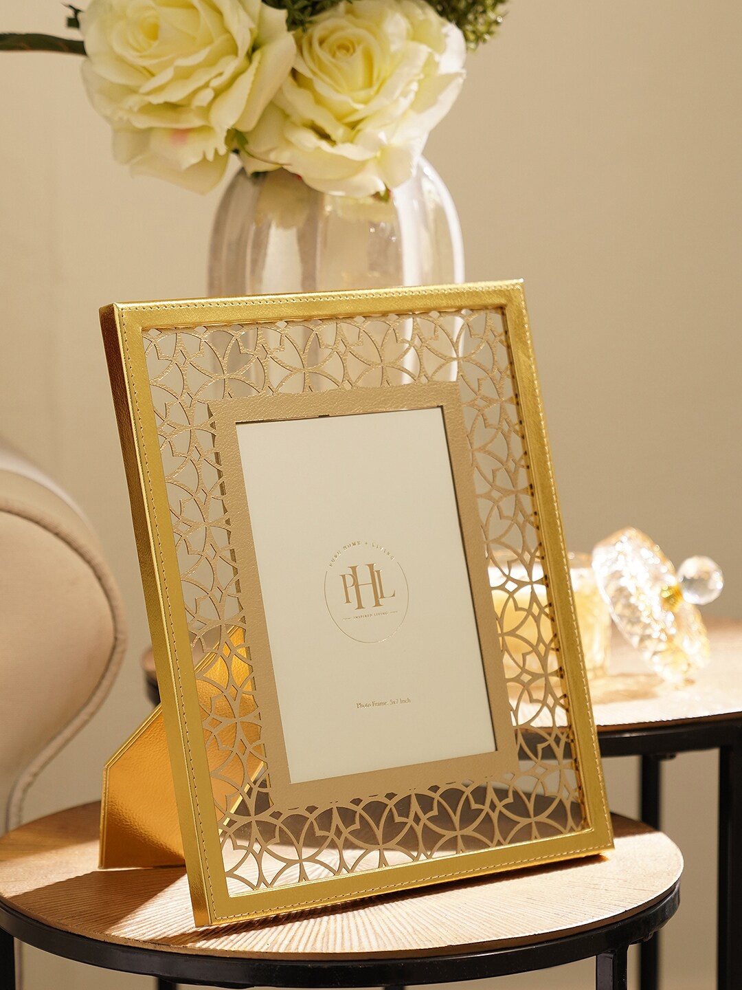 

Pure Home and Living Gold Toned Lazer Cut Faux Leather Photo Frame