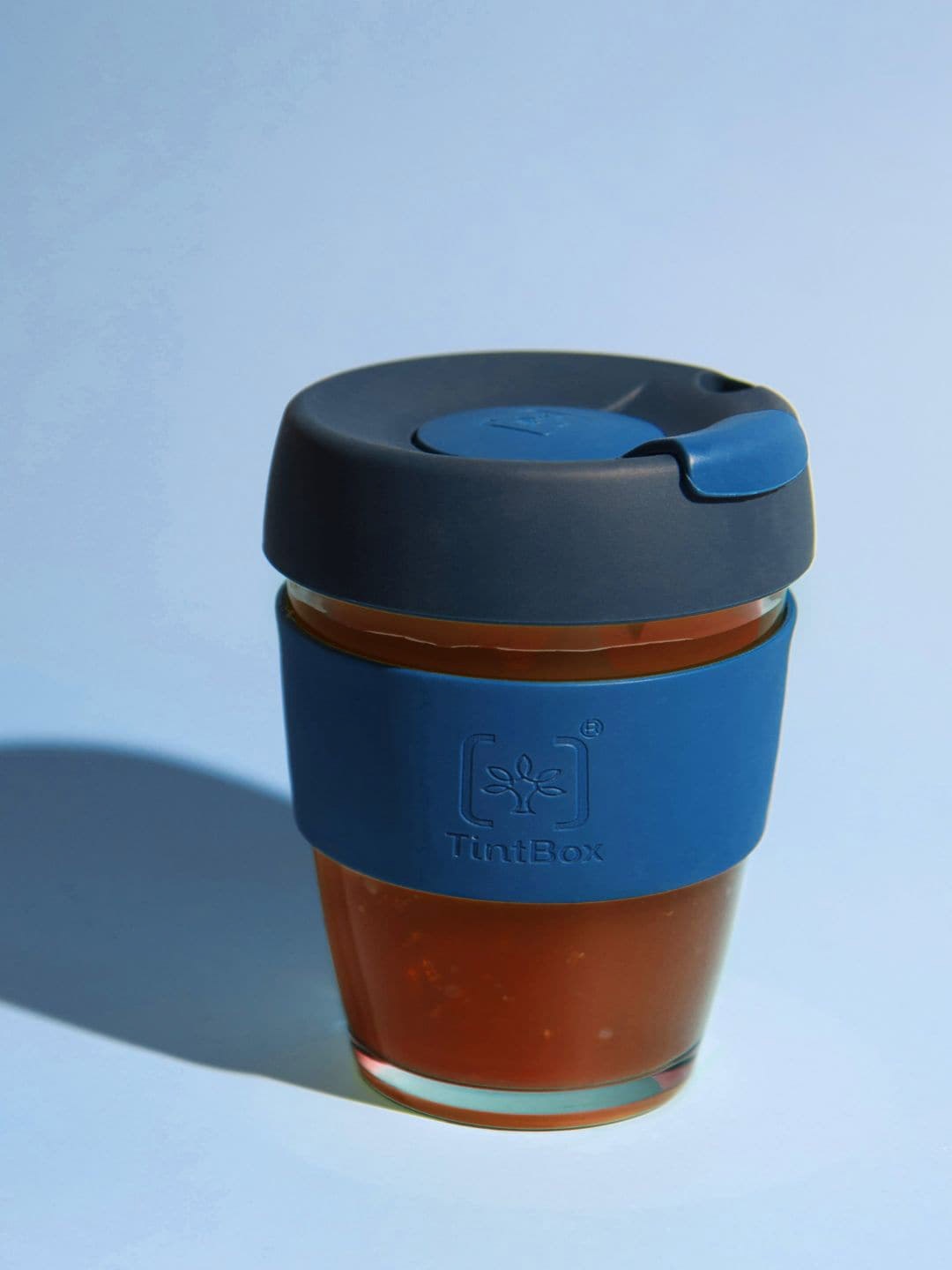

TintBox Blue Solid Glass Matte Coffee Cup with Silicone Lid - 350 ML