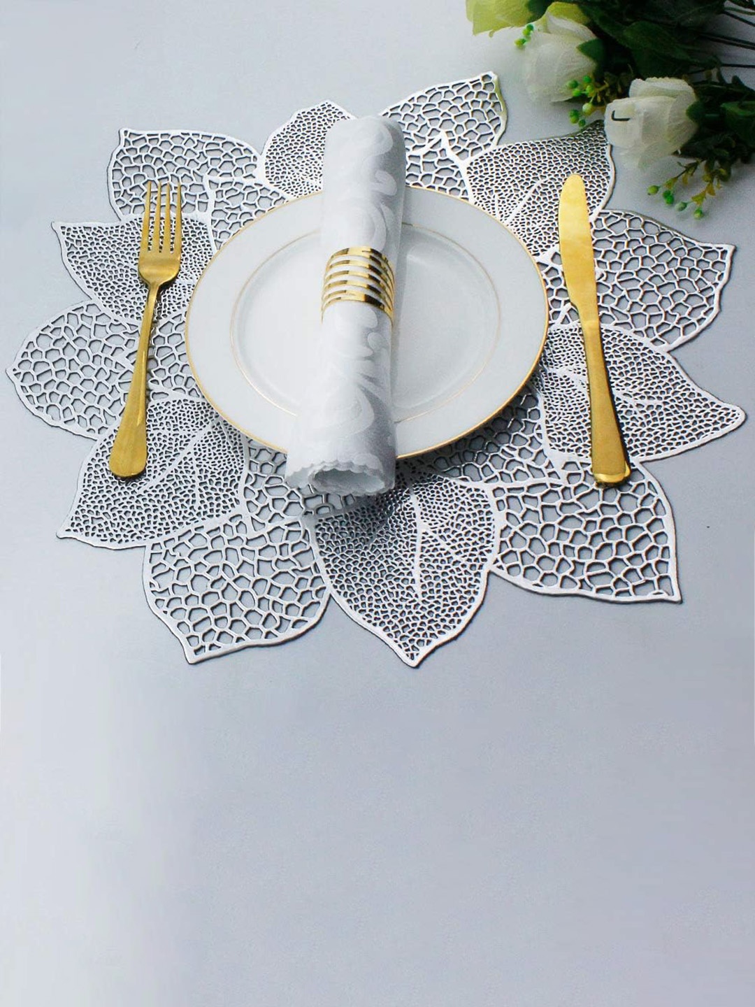 

Dakshya Industries Silver Toned 6 Pieces Round Kitchen Table Placemats