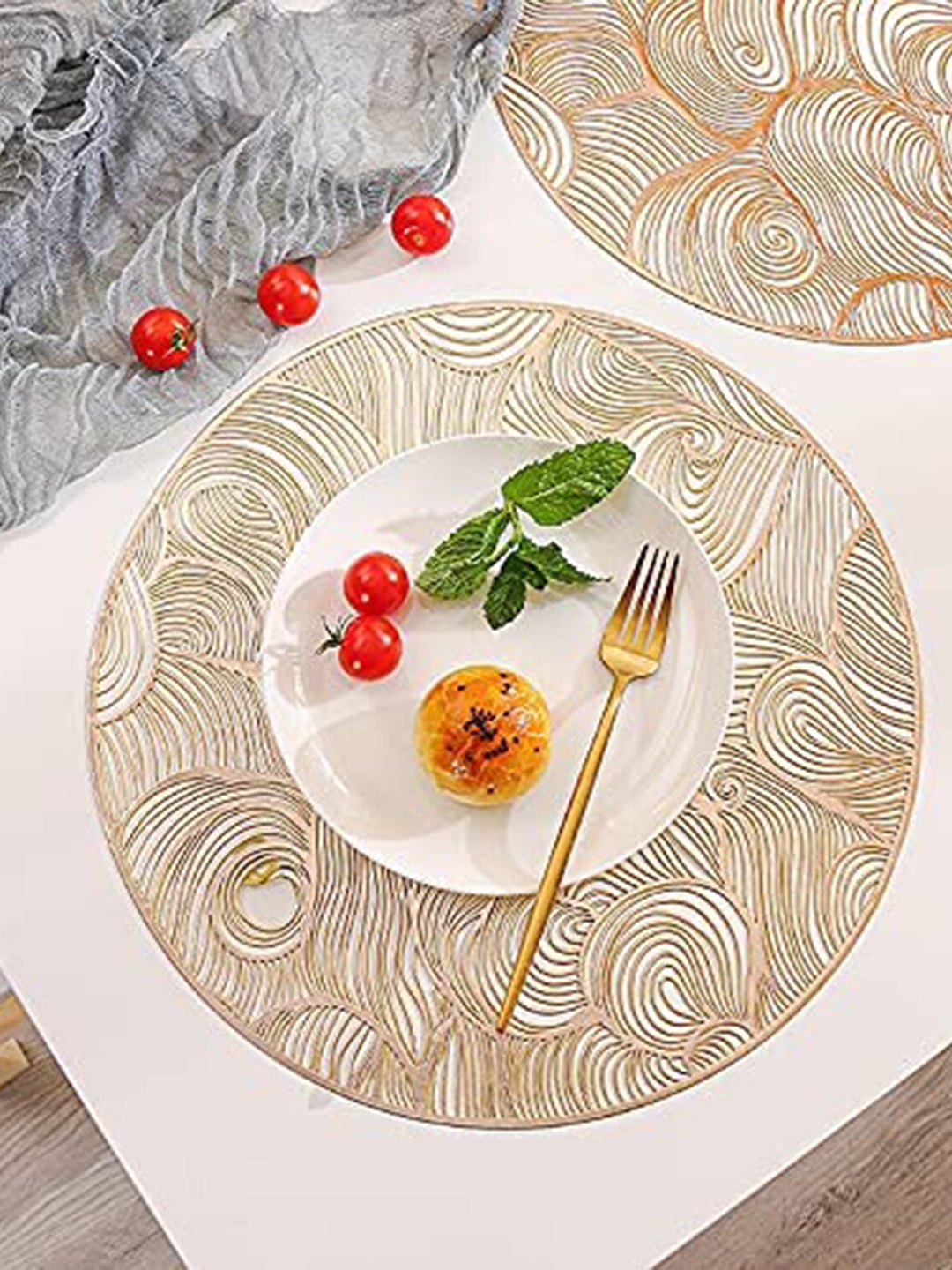 

Dakshya Industries Gold Toned 6 Pieces Curly-Design Round Table Placemats
