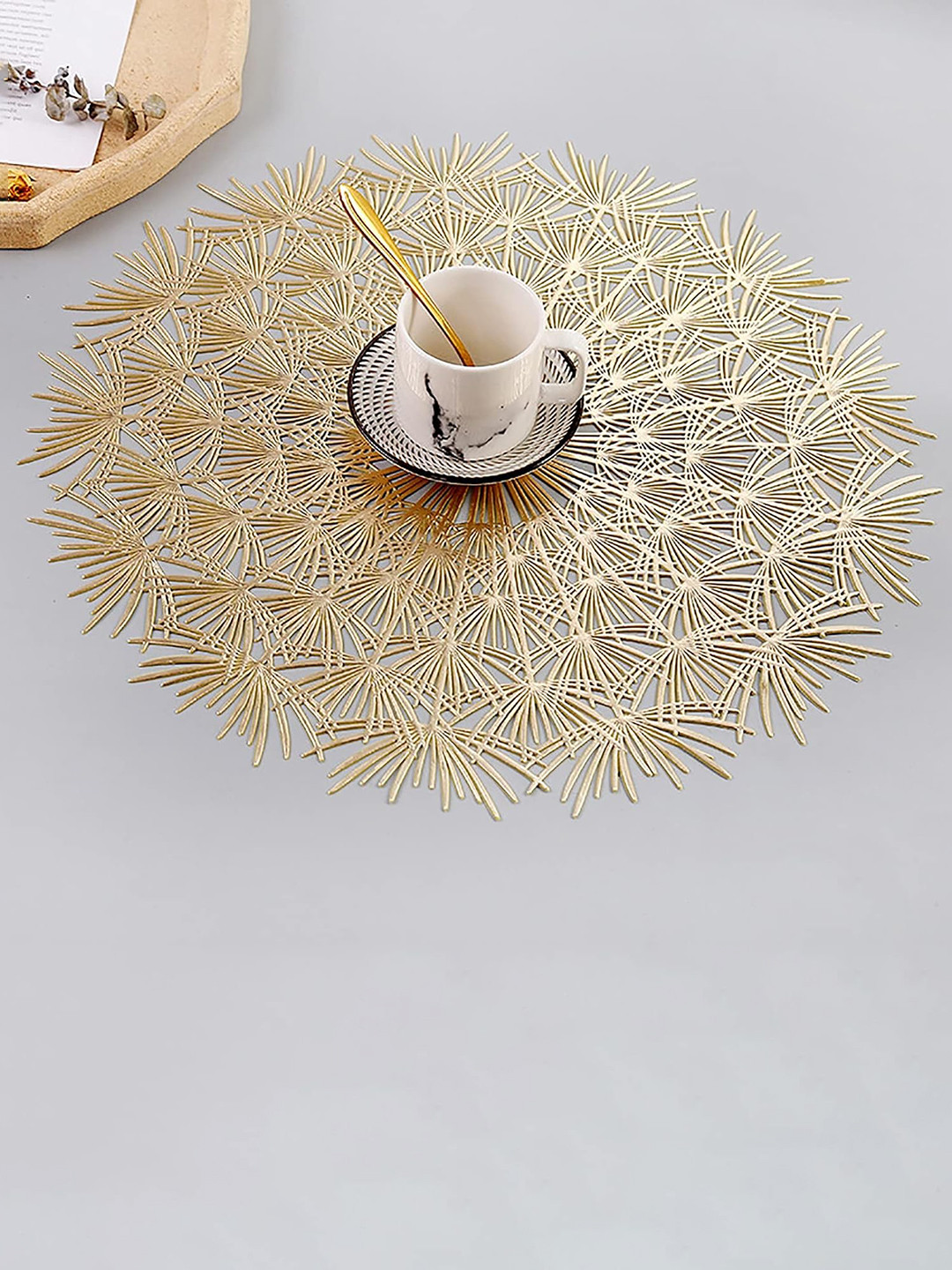 

Dakshya Industries Gold Toned 6 Pieces Floral Round Table Placemats