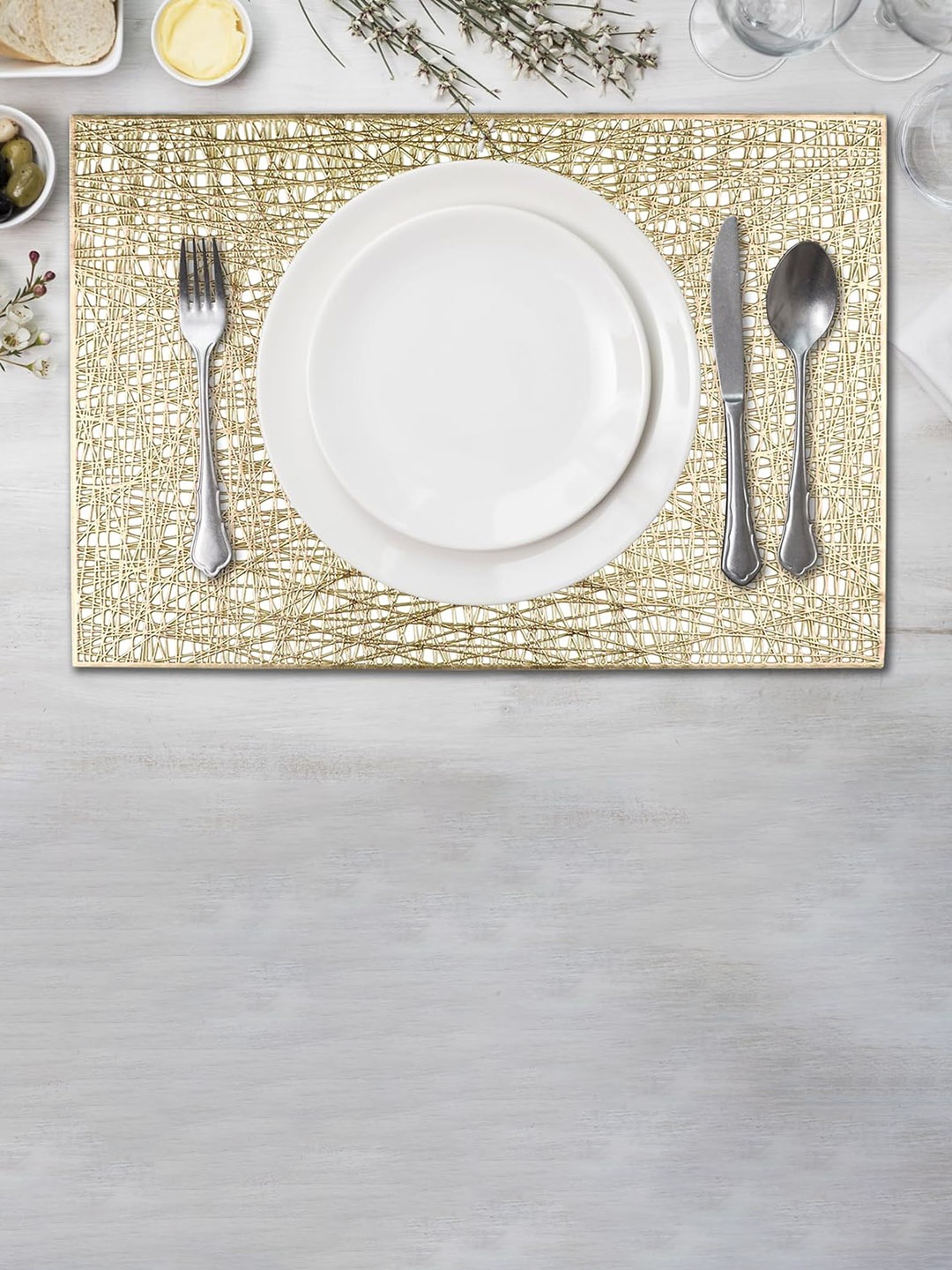 

Dakshya Industries Gold Toned 6 Pieces Geometric Rectangle Table Placemats