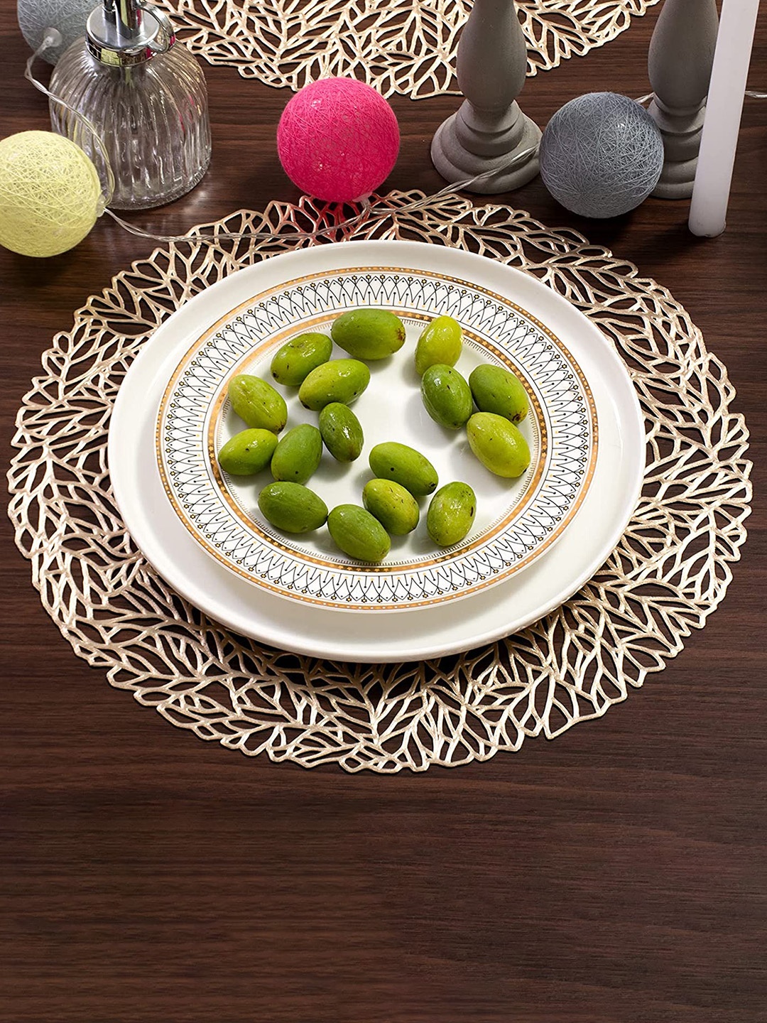 

Dakshya Industries Gold Toned 6 Pieces Geometric Round Table Placemats