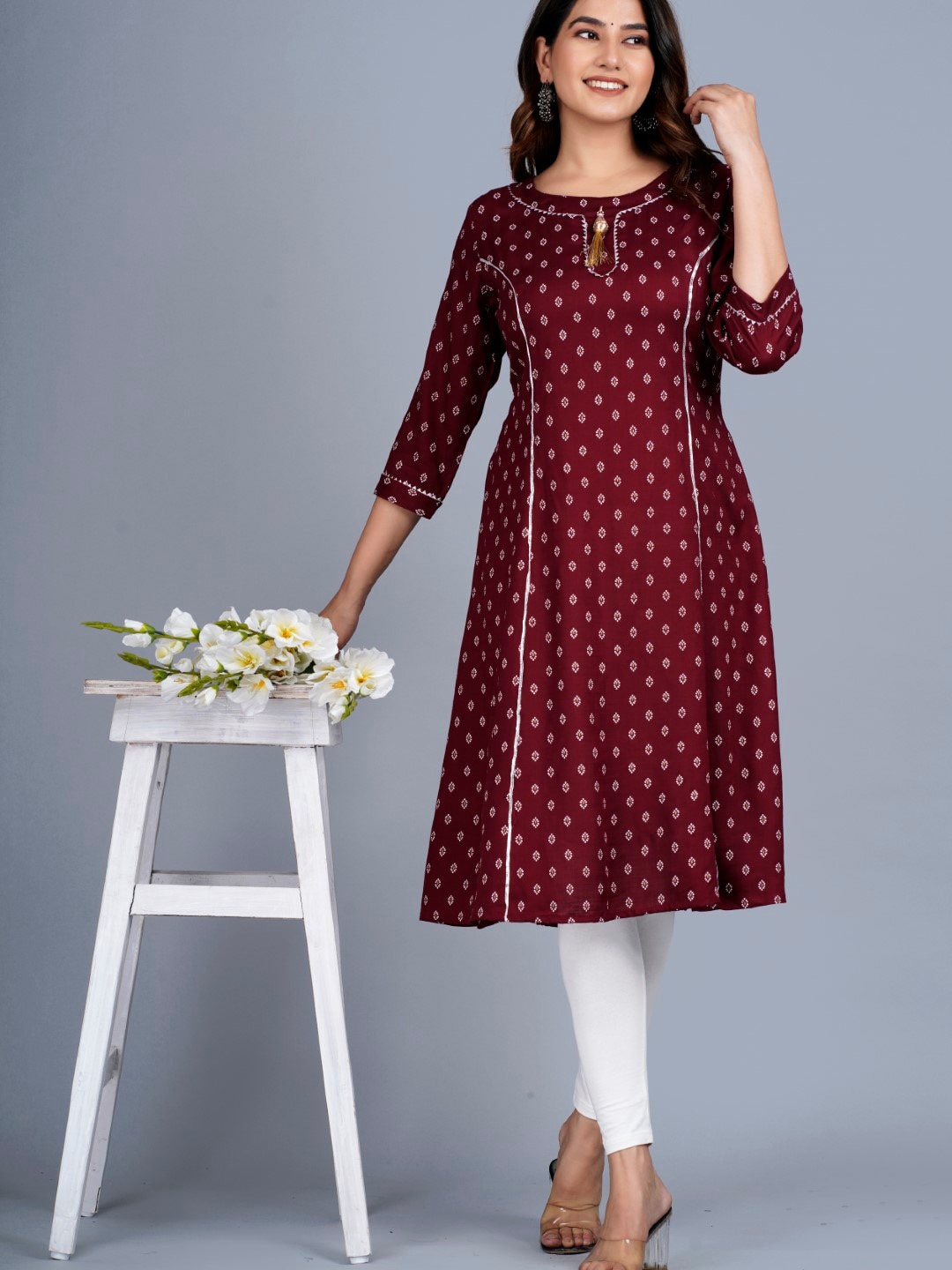 

SIPET Floral Printed Round Neck Gotta Patti A-Line Kurta, Maroon