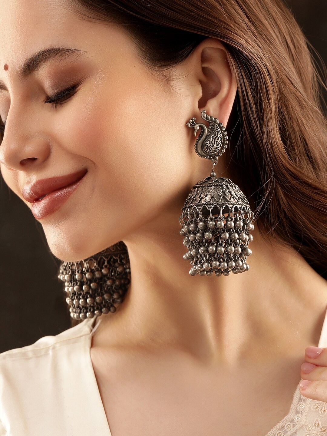 

Rubans Silver-Plated Beaded Oxidised Peacock Shaped Jhumkas Earrings