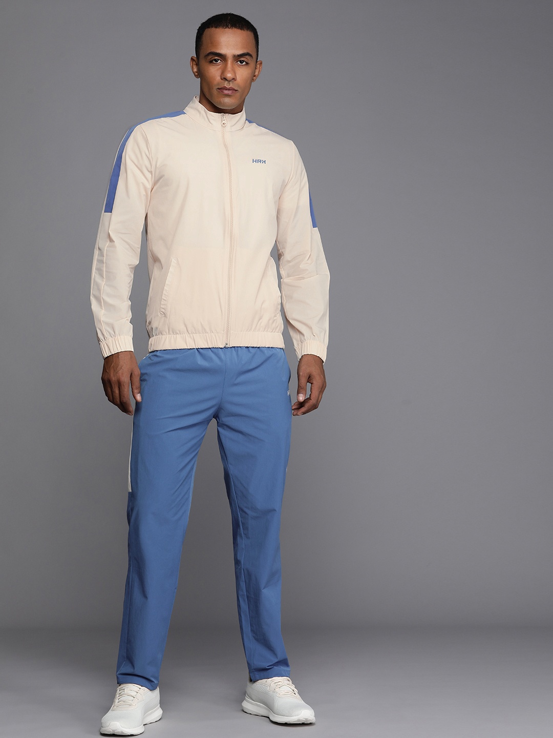 

HRX by Hrithik Roshan Men Solid Rapid-Dry Tracksuits, Cream