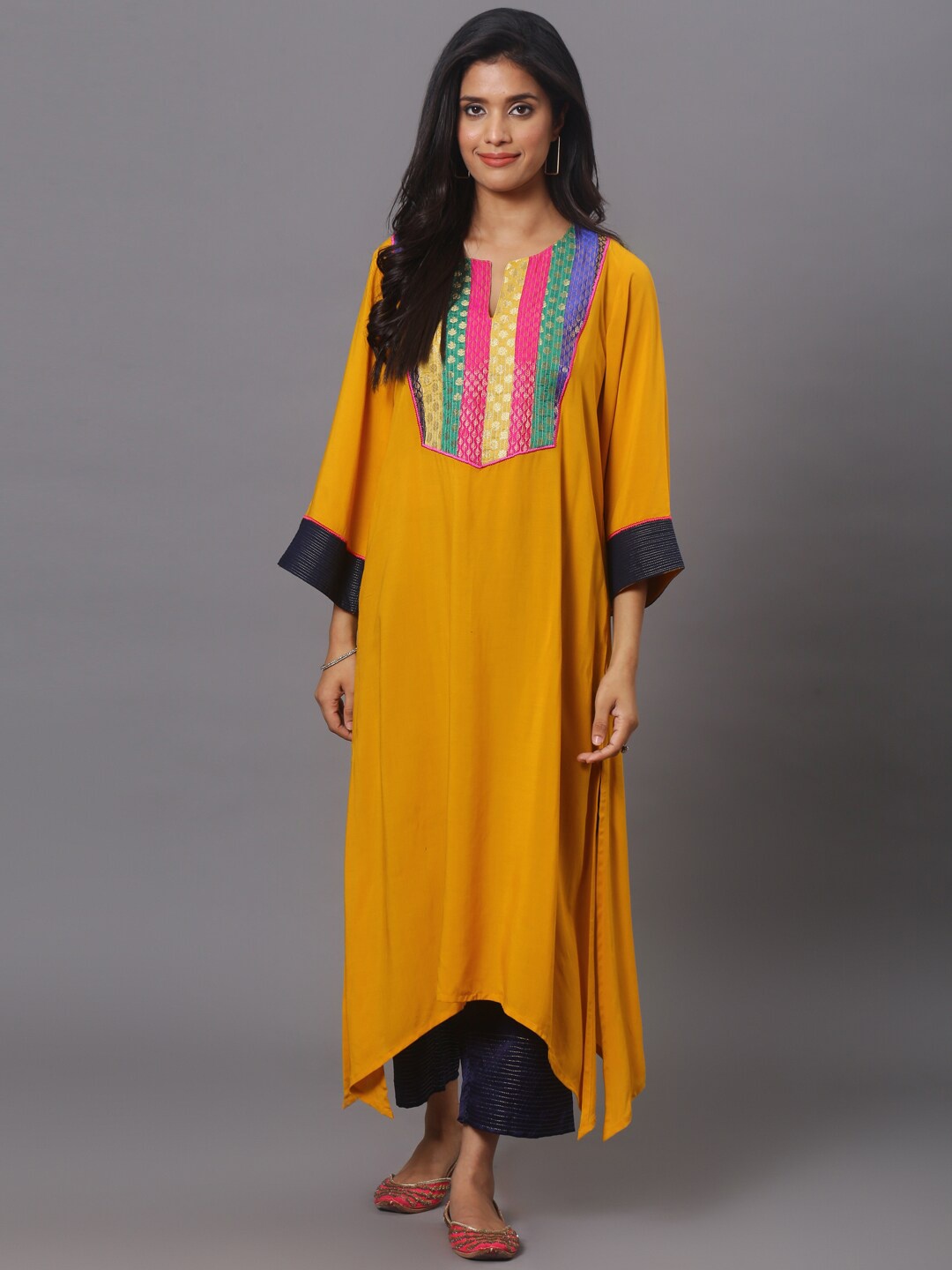 

Spring Soul Ethnic Motifs Yoke Design A-line Kurta with Trousers, Mustard