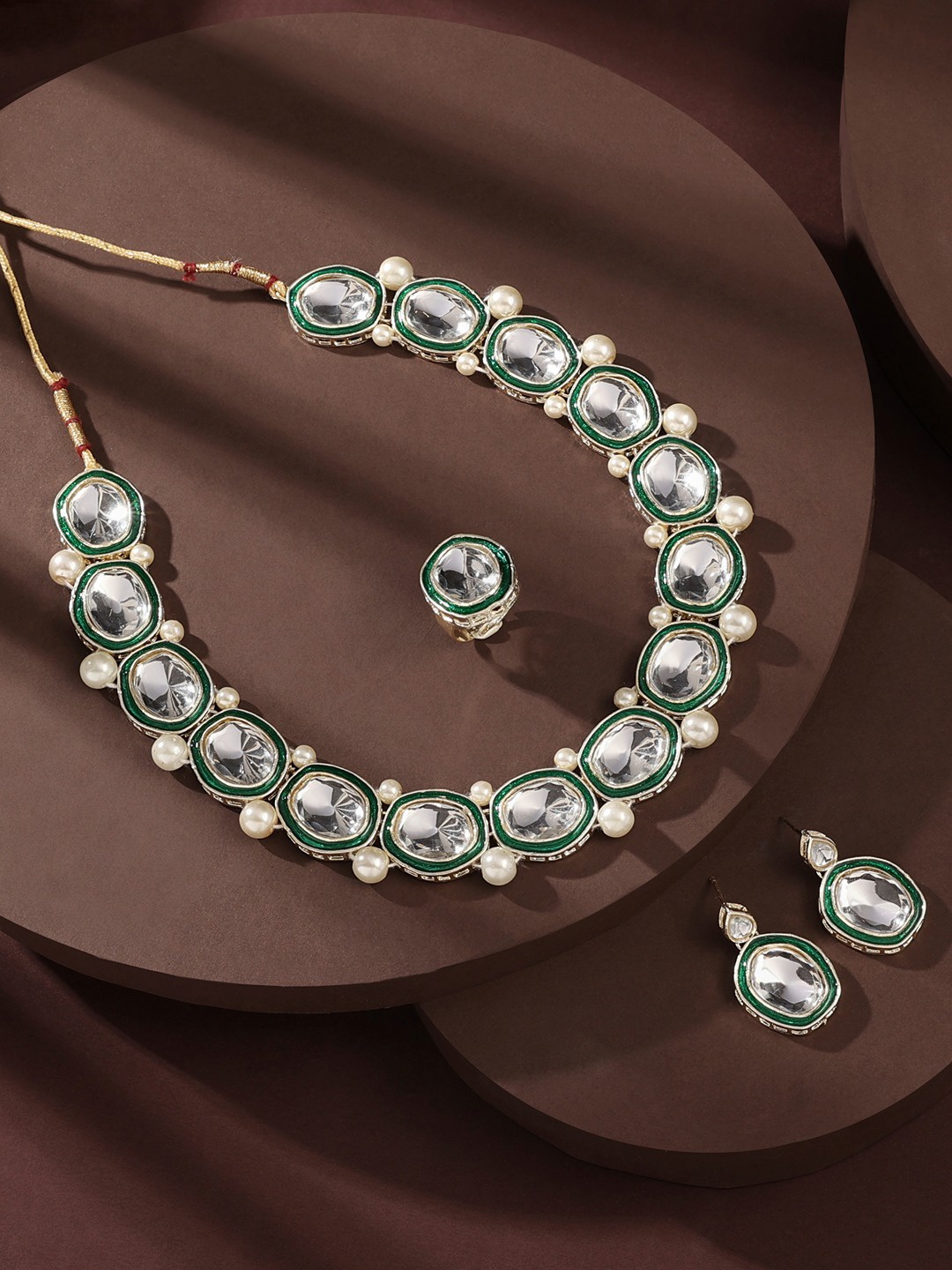 

Zaveri Pearls Gold Plated Stones Studded & Pearls Beaded Jewellery Set