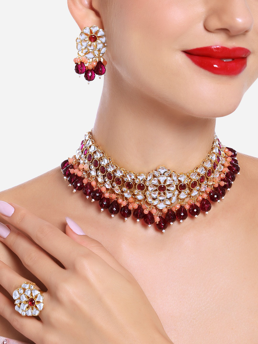 

Zaveri Pearls Gold-Plated Cluster Drops Kundan Necklace With Earrings & Finger Ring