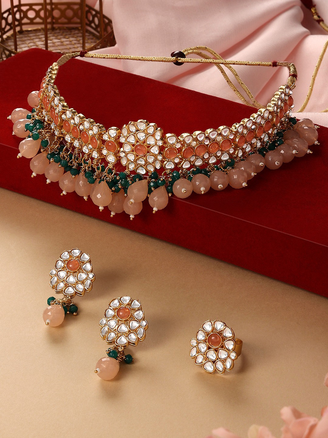 

Zaveri Pearls Gold Plated Kundan Studded & Beaded Jewellery Set