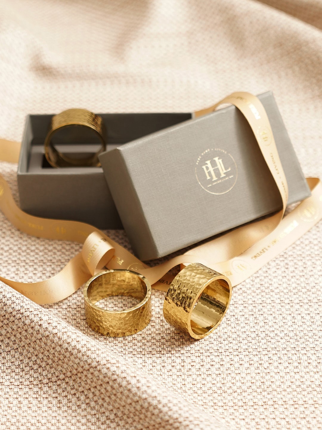 

Pure Home and Living Gold-Toned 4 Pieces Metal Textured Napkin Rings