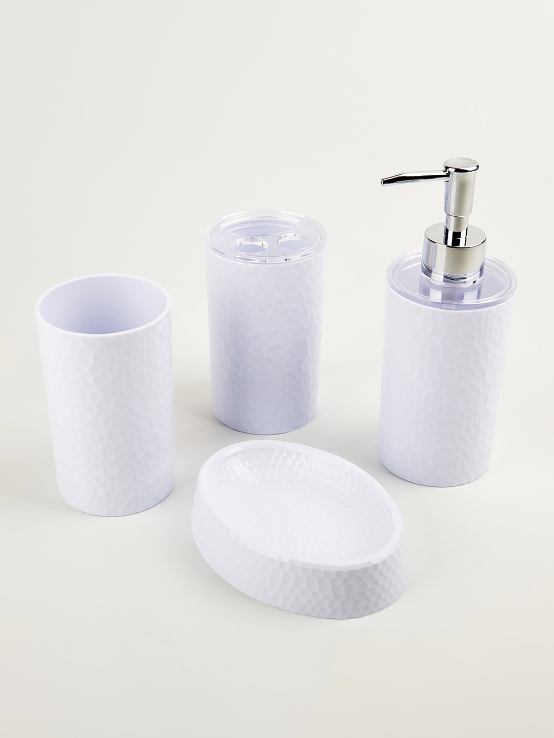 

Home Centre White 4 Pieces Textured Bathroom Set