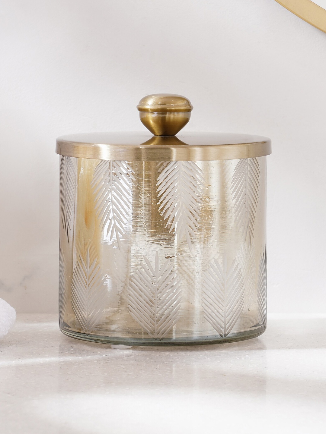 

Home Centre Gold Toned Textured Glass Glossy Cotton Jar