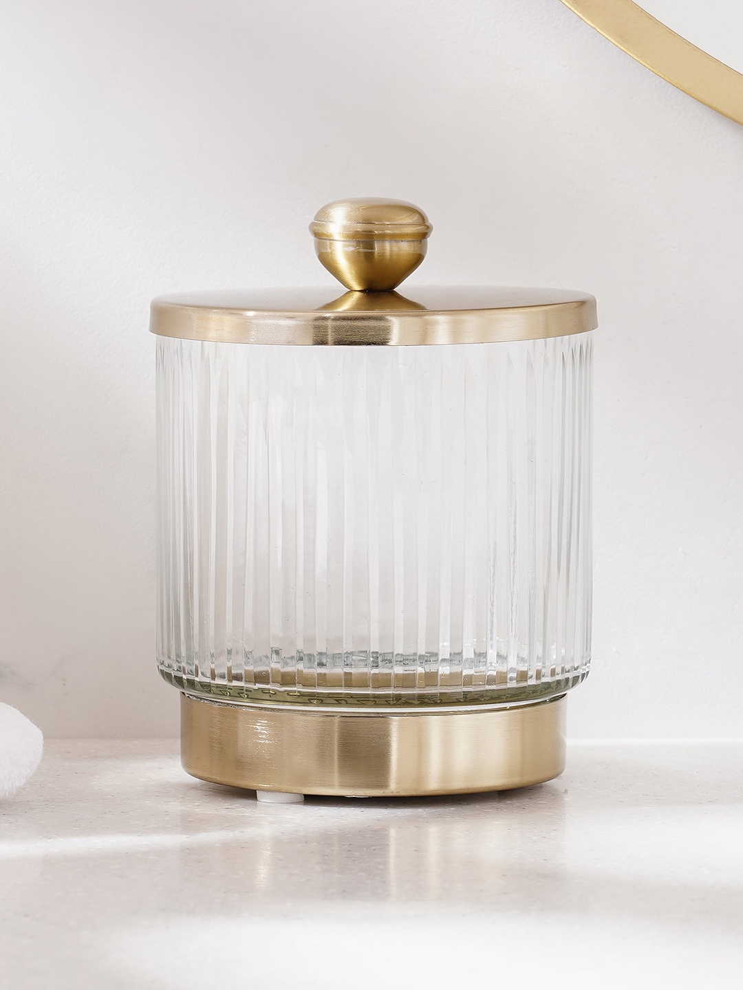 

Home Centre Transparent Textured Panama Canal Cotton Jar, Gold