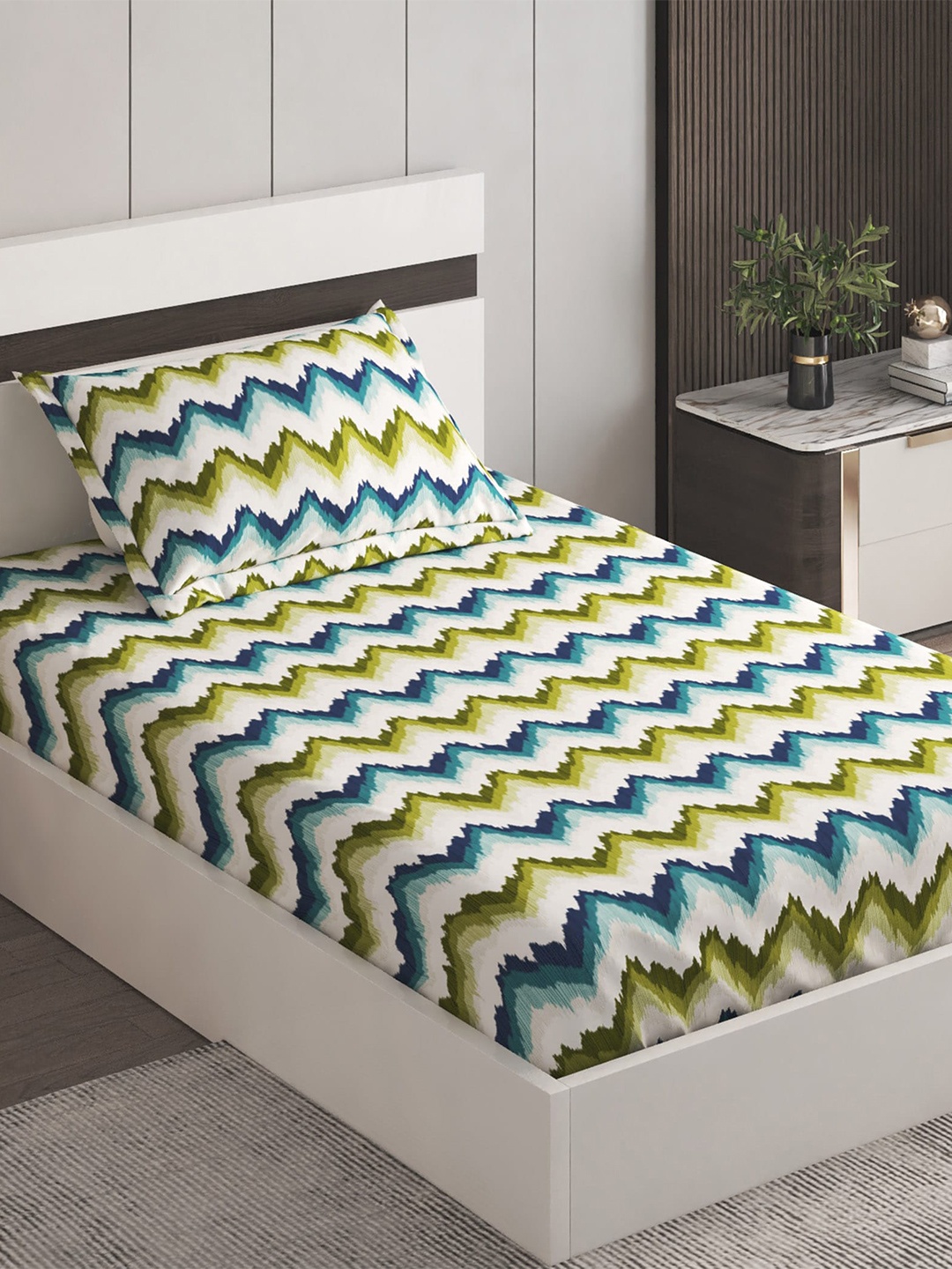 

Home Centre Harold White & Green Geometric 120 TC Single Bedsheet with 1 Pillow Cover