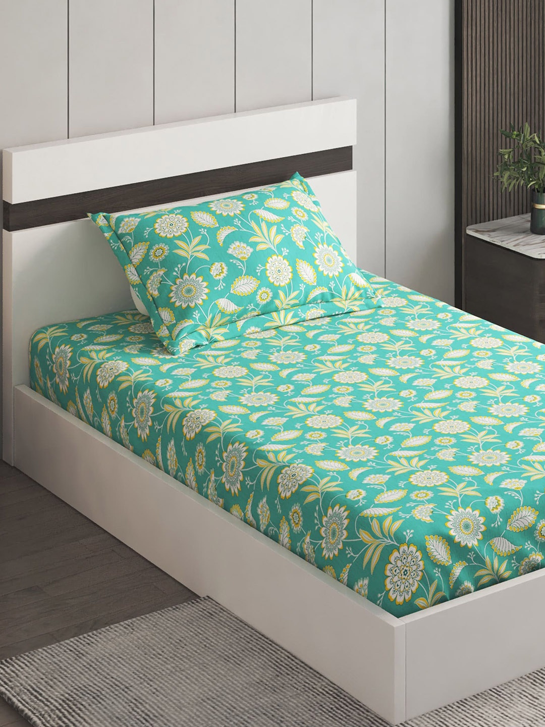 

Home Centre Harold Teal Green & Yellow Floral 120 TC Single Bedsheet With 1 Pillow Cover