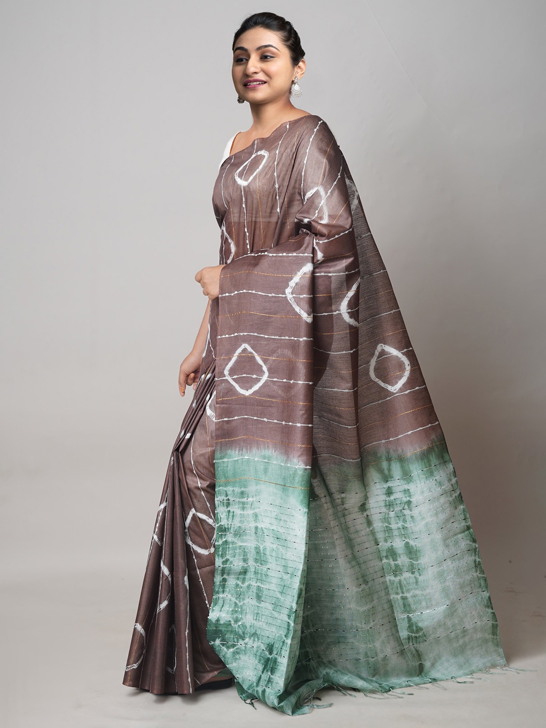 

Unnati Silks Brown & Green Silk Cotton Leheriya Saree