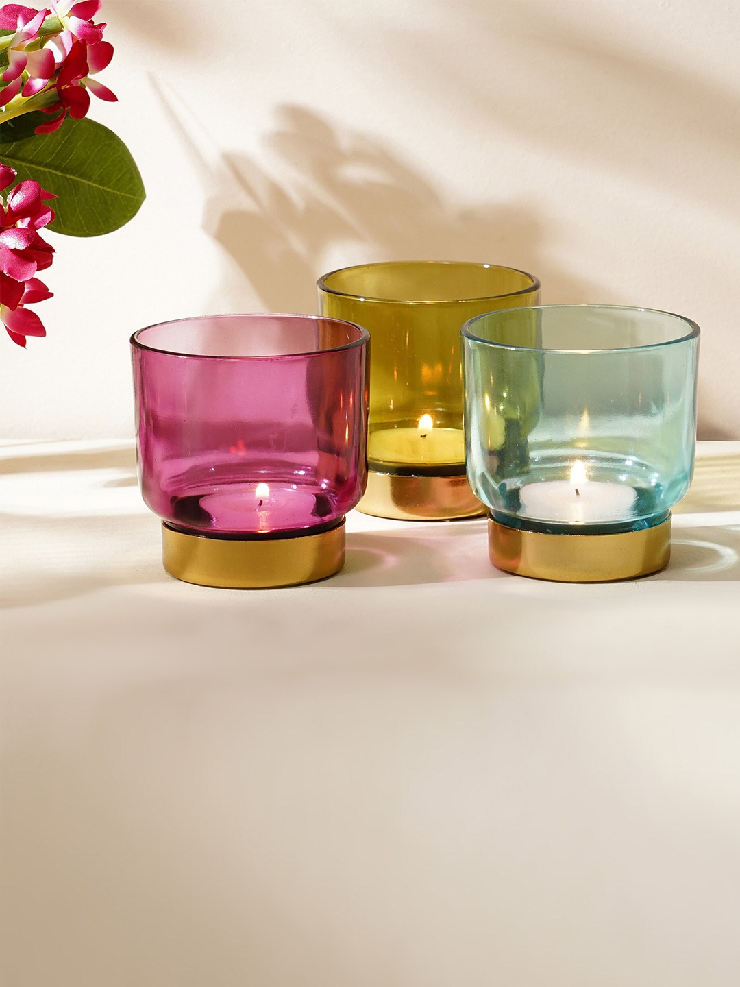 

Home Centre Purple & Green 3 Pieces Textured Glass T-Light Holders
