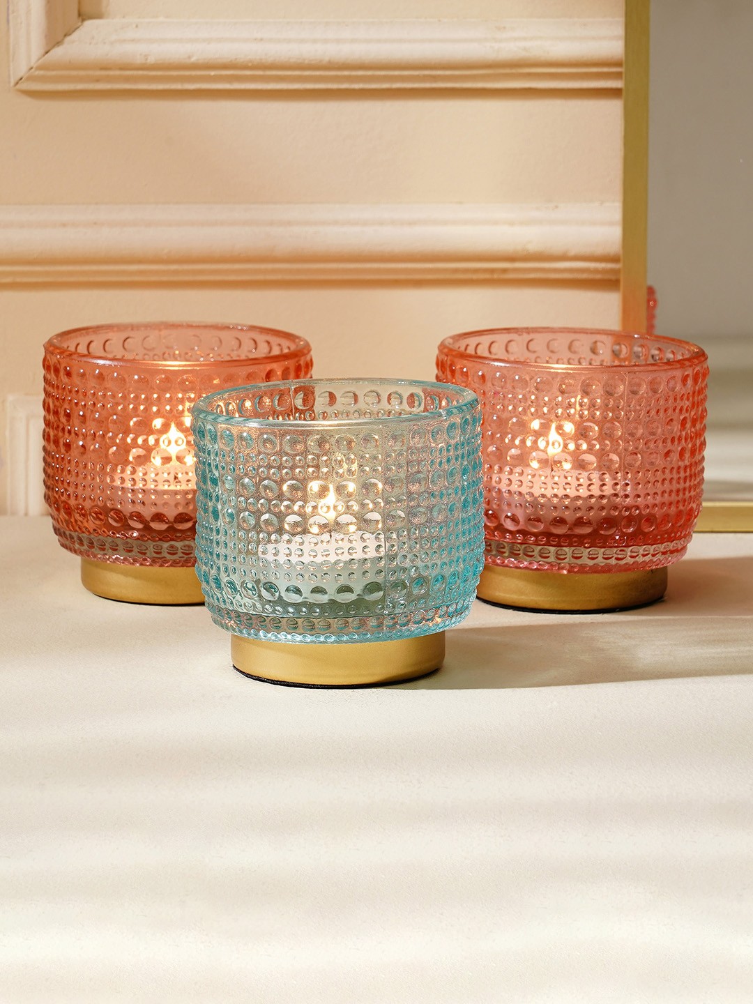 

Home Centre Shalimar 3 Pcs Pink & Blue Glass Dotted T-Light Holders