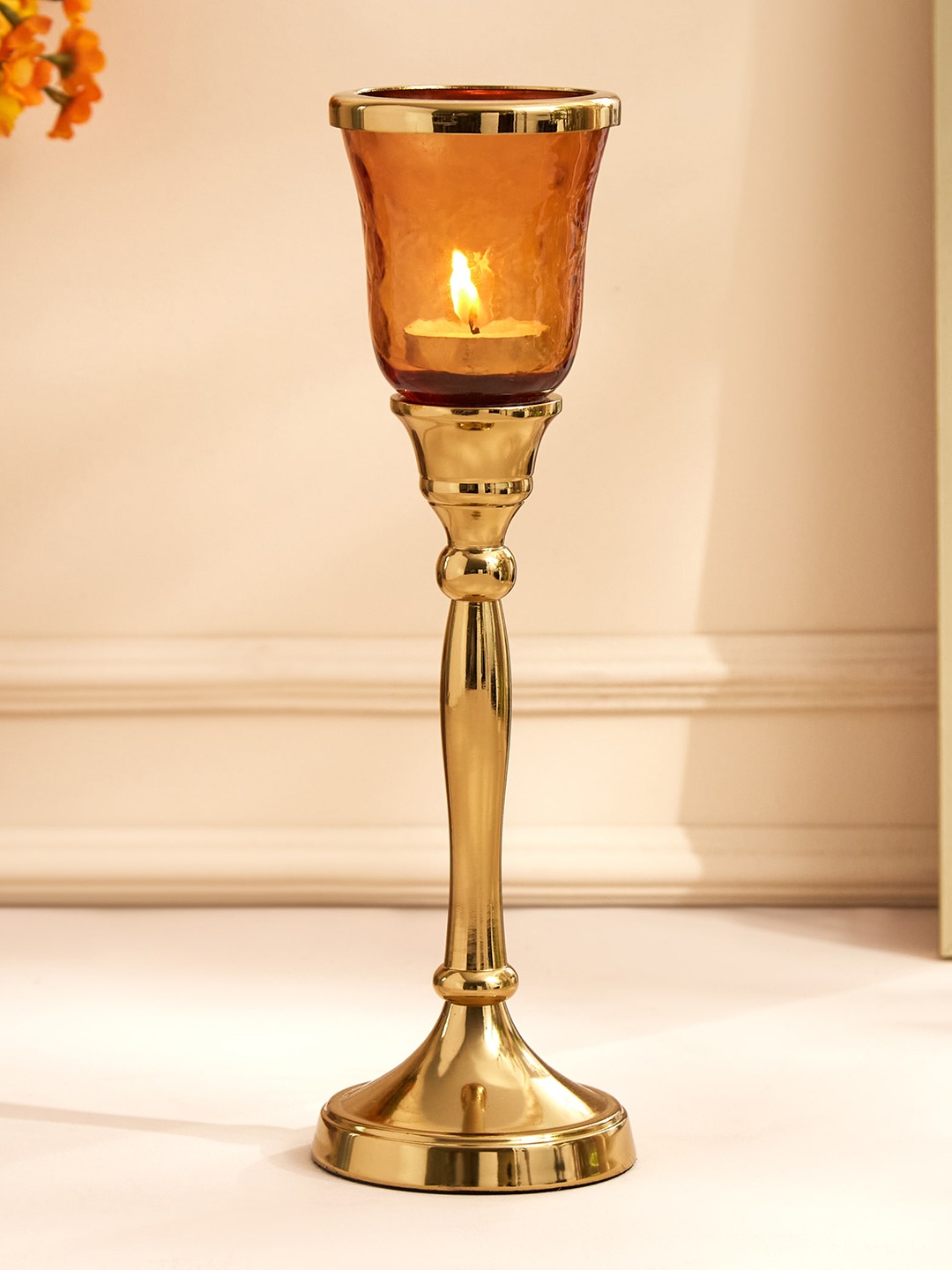 

Home Centre Orange Textured Glass Pedestal T-Light Holder