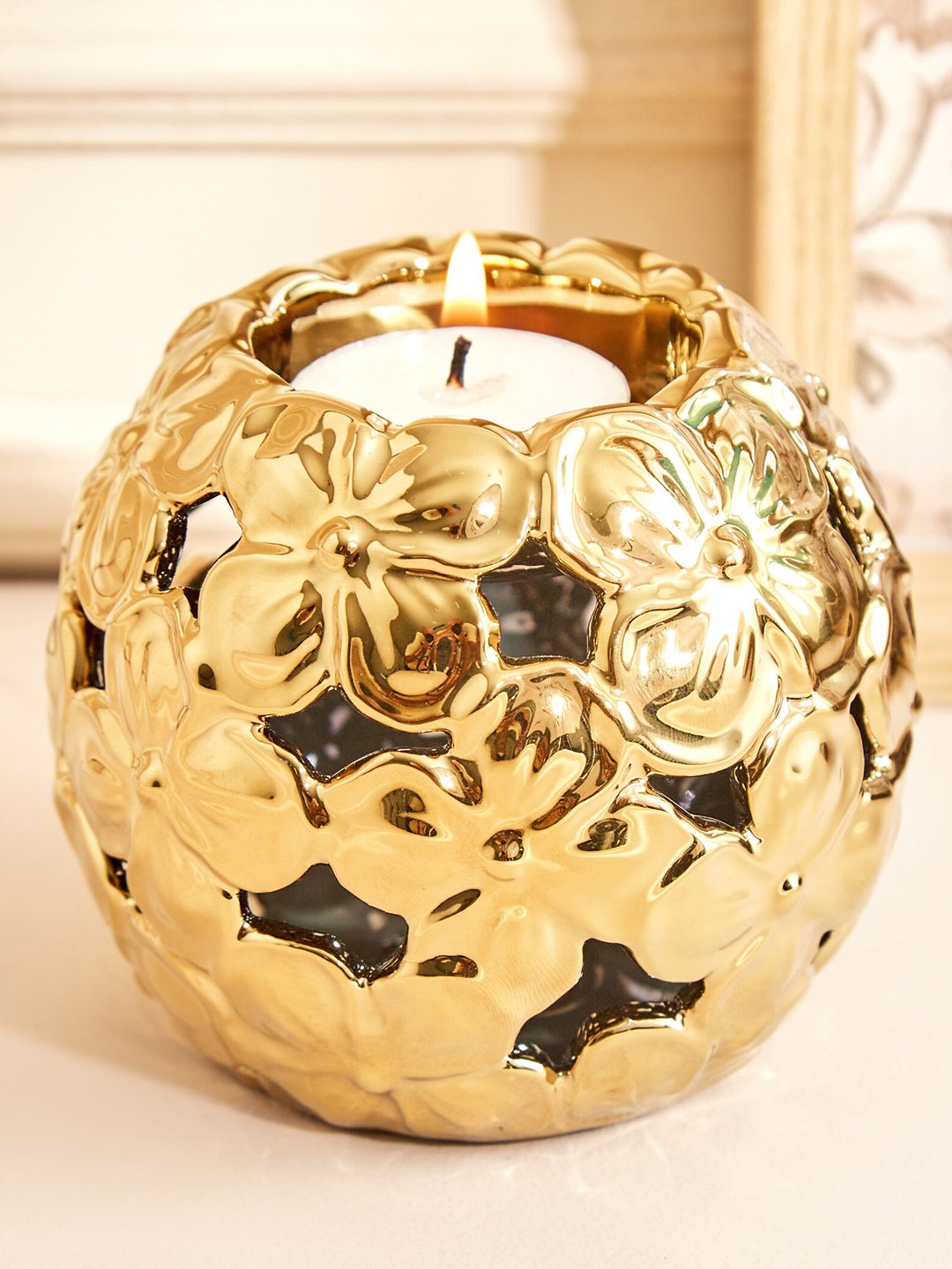 

Home Centre Gold Toned & Brown Textured Porcelain Floral T-Light Holder