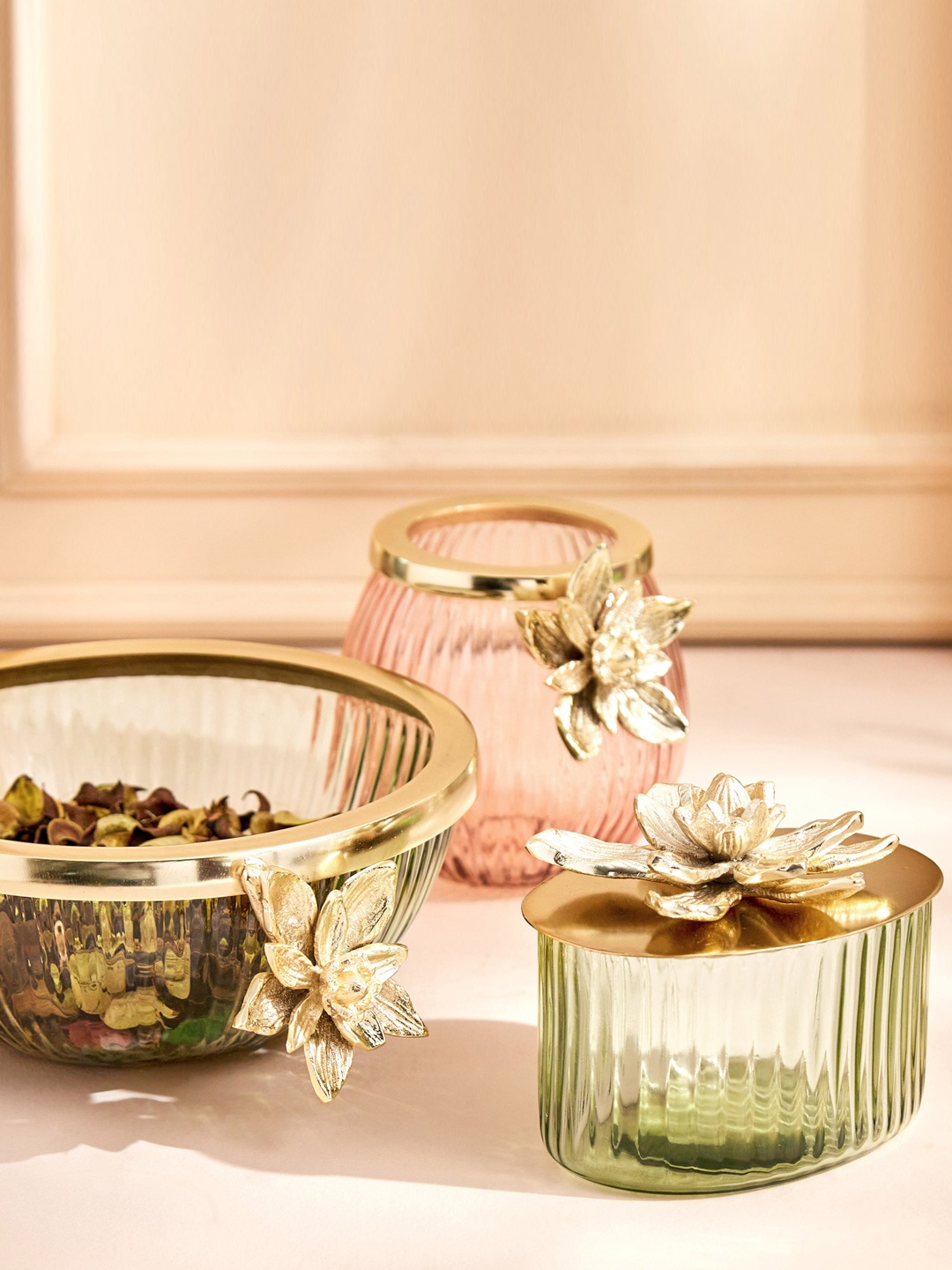 

Home Centre Moksha Green Flower Decorative Glass Canister With Aluminium Lid